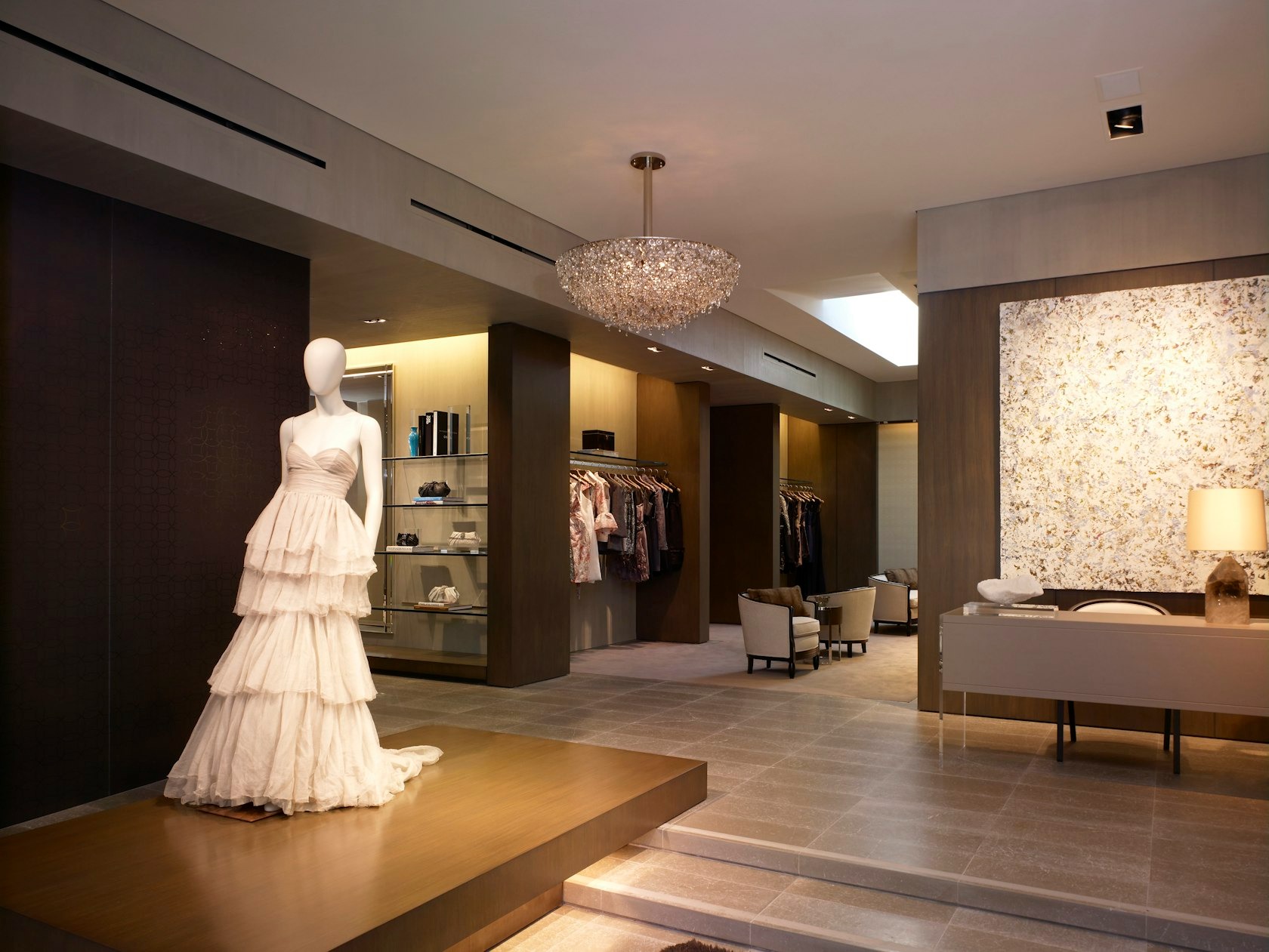 Monique Lhuillier flagship showroom with concealed perimeter lighting
